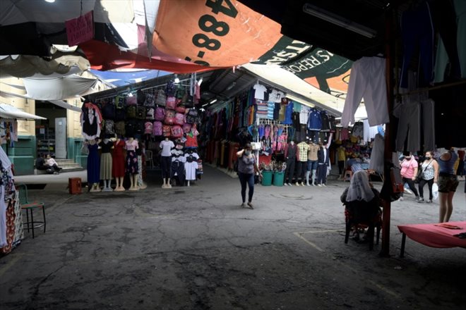 Sur un marché de San Salvador où les bitcoins sont acceptées, le 24 mai 2022