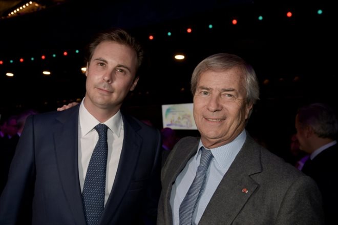 Cyrille Bolloré (L) et son père Vincent Bolloré (R), le 15 avril 2019, à Paris